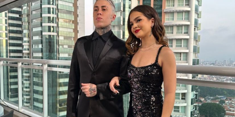 MC Daniel gravou um clipe para a sua nova música "Grana, Dinheiro e Fama" que conta com a participação da atriz e namorada, Mel Maia. O casal, se inspirou em Brad Pitt e Angelina Jolie no filme Sr. e Sra. Smith para a construção dos personagens do videoclipe